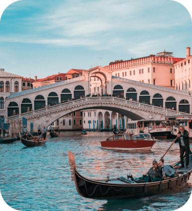 Gondolas on Venice canal with Rialto Bridge